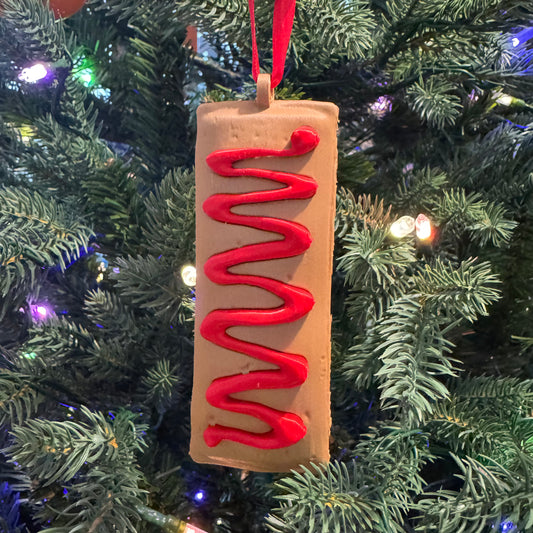 Pastel con Ketchup Ornamento Navideño